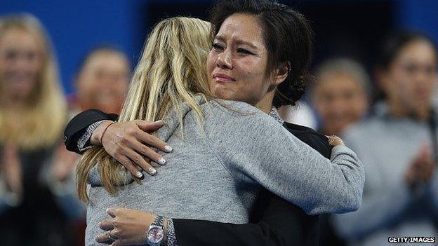 Li Na of China hugs Petra Kvitova of Czech during her retirement ceremony