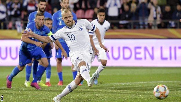 Teemu Pukki scores a penalty against Greece