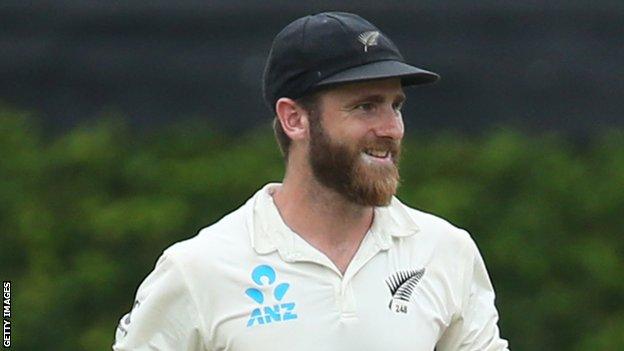 Kane Williamson smiles on the pitch