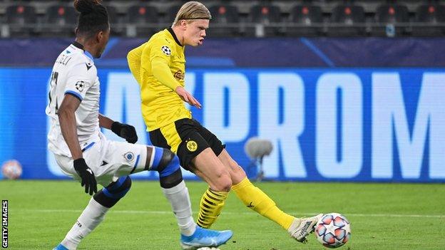 Erling Braut Haaland scores Borussia Dortmund's first goal against Club Bruges in the Champions League