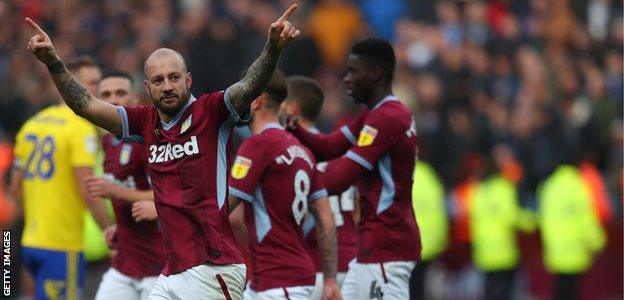 Aston Villa's Alan Hutton celebrates his goal against Birmingham