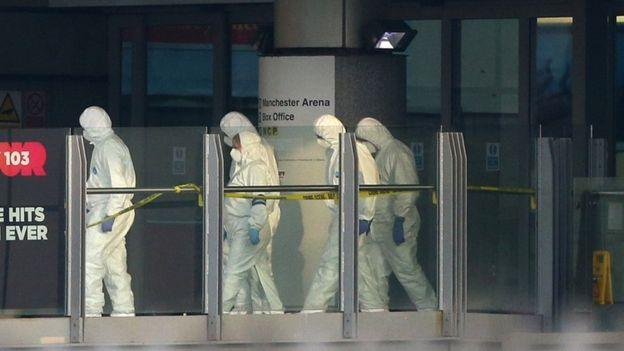 Forensic teams working at the site in Manchester