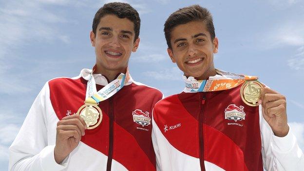 Javier and Joaquin Bello with Commonwealth gold