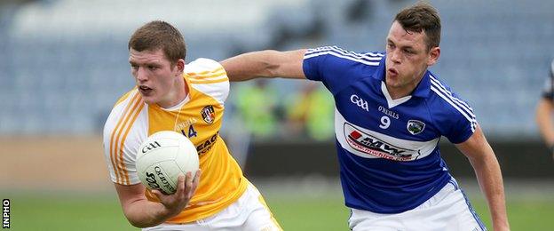 Antrim's Owen Gallagher attempts to get away from John O'Loughlin