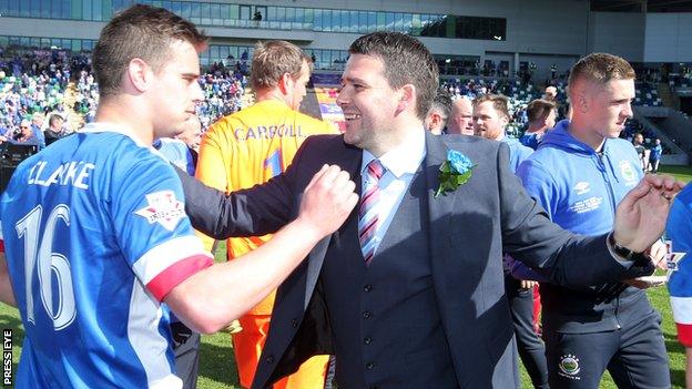 Matthew Clarke celebrates with Linfield manager David Healy after the club's 3-0 Irish Cup final win over Coleraine