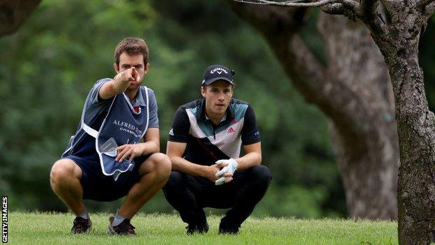 Matthew Jordan and his caddie assess a shot at the Alfred Dunhill Championship in South Africa in November