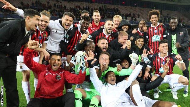 Nice players celebrate reaching the French Cup final