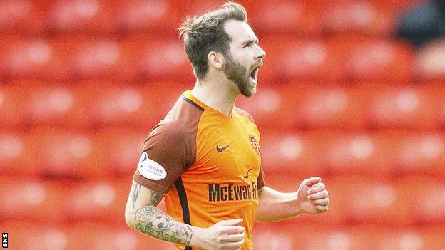 Dundee United's James Keatings celebrates