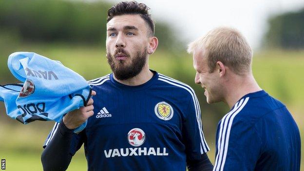 Scotland's Robert Snodgrass shares a joke with Steven Naismith