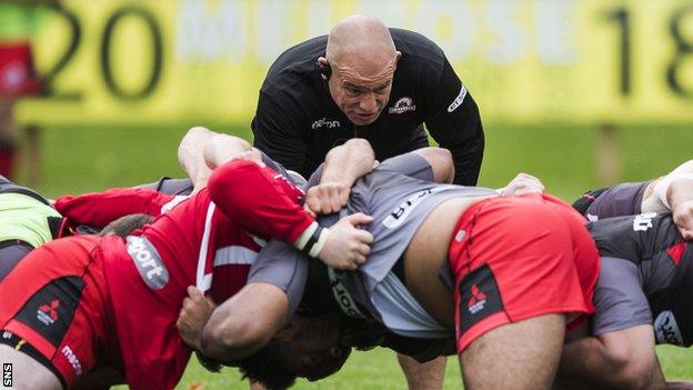 Richard Cockerill oversees an Edinburgh scrum session