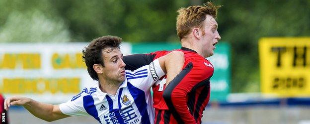 Liam Craig (right) in action for St Johnstone against Real Sociedad