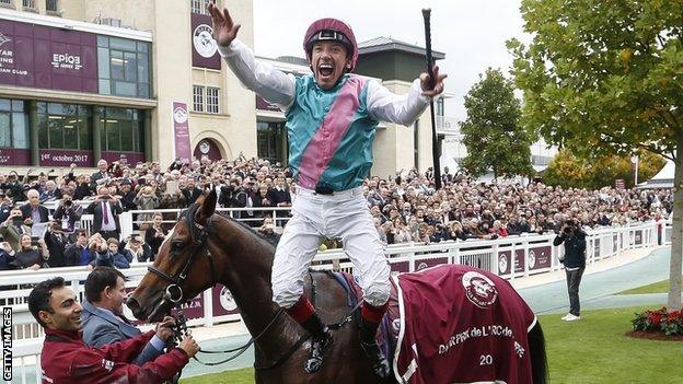 Frankie Dettori performs a flying dismount from Enable