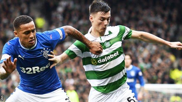 Celtic left-back Kieran Tierney holds off Rangers' James Tavernier