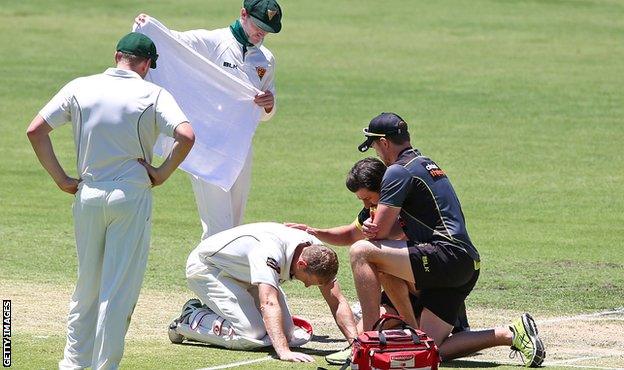 Adam Voges is treated by medical staff