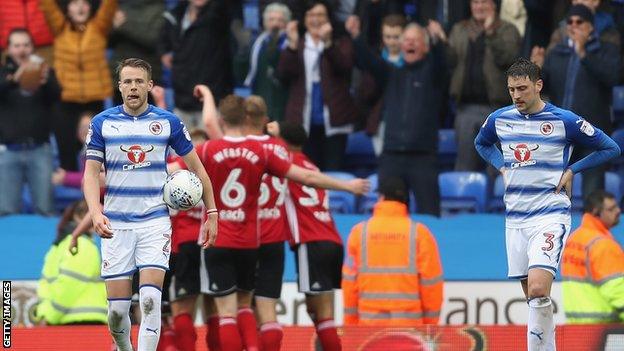 Reading defender Chris Gunter reacts to conceding a goal against Ipswich