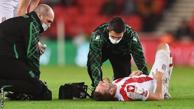 Stoke's Nick Powell receives treatment