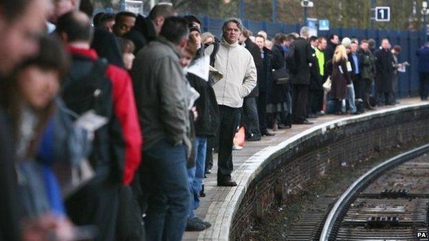 rail platform full of passengers