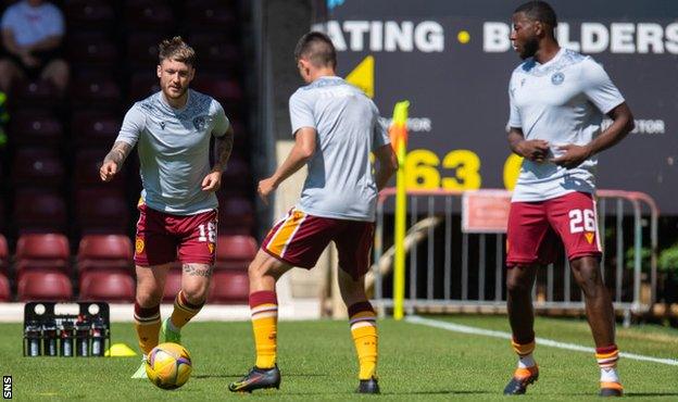 Callum Slattery warms up for Motherwell