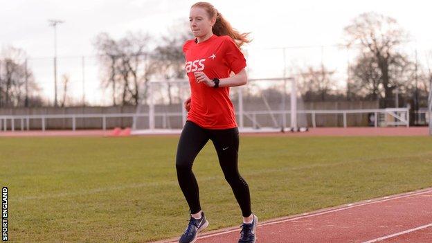 Woman running in park