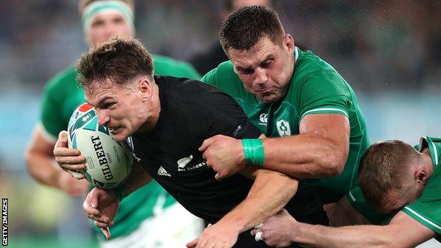 New Zealand's George Bridge is tackled by CJ Stander of Ireland