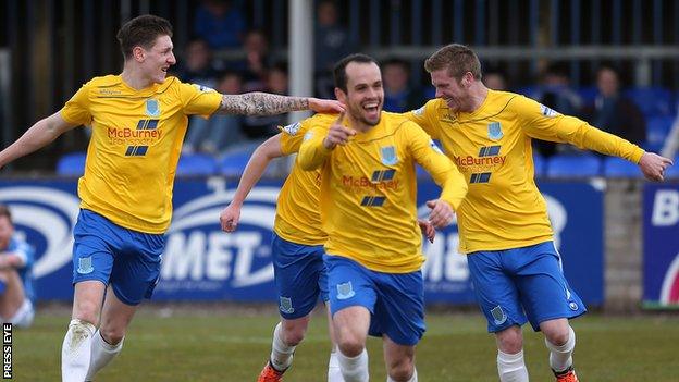 Ballymena players celebrate one of their four goals against Dungannon