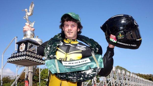 Mike Browne holding the trophy