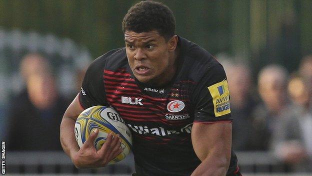 Saracens winger Nathan Earle carries the ball into contact