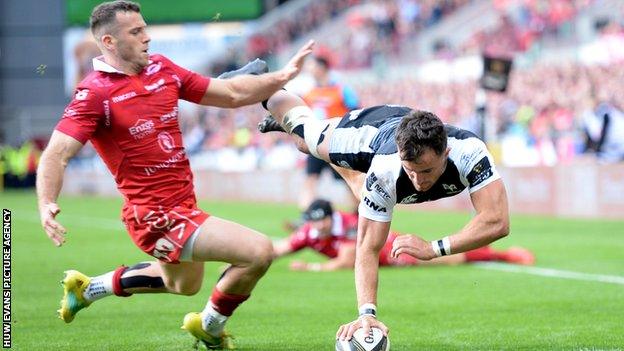Luke Morgan of Ospreys scores a try