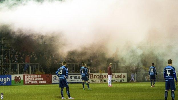 A flare goes off at Station Park, Forfar