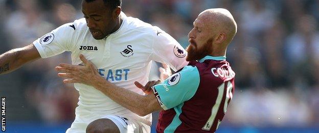 West Ham defender James Collins (right)