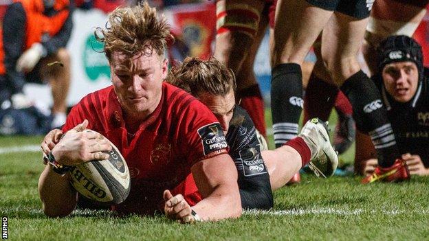 Chris Cloete burrows his way over the Ospreys line to score Munster's third try