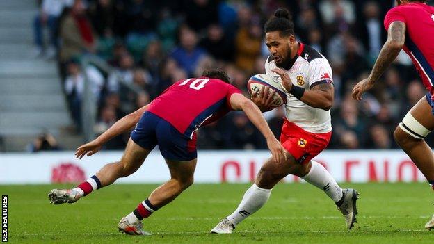 Solomone Kata playing for Tonga against England