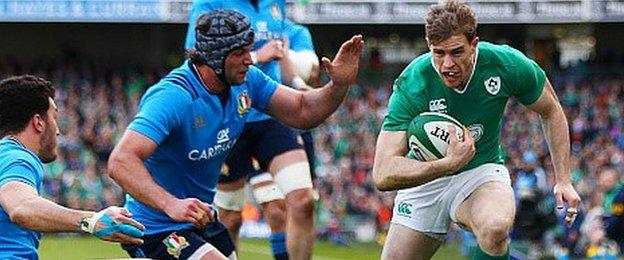 Ireland wing Andrew Trimble takes on the Italy defence