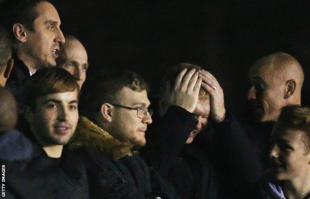 Gary Neville (left), Paul Scholes (hands on head) and Nicky Butt (right)