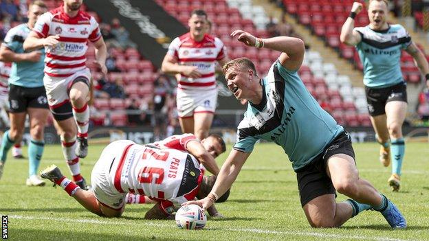 Hull's Jack Brown celebrates a try