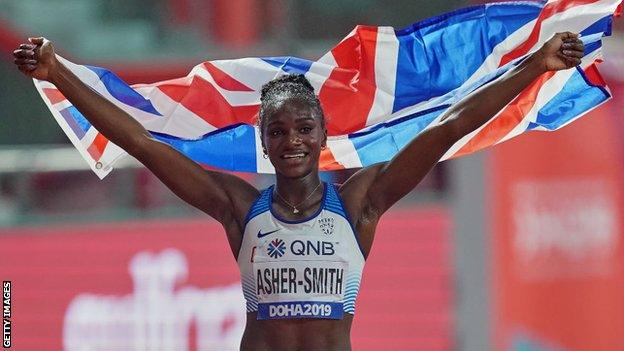 Dina Asher-Smith celebrates at the 2019 World Championships