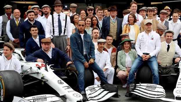 Mercedes team dressed in 1950s' clothes