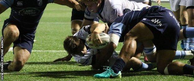 Ali Price touches down for Glasgow's third try at the Arms Park