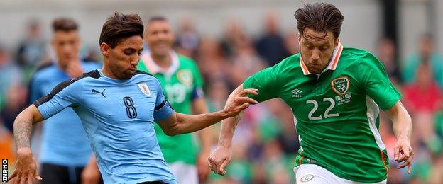 Harry Arter (right) battles in Sunday's friendly in Dublin