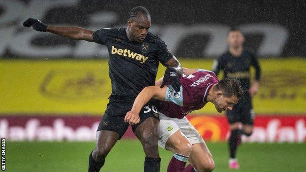 Michail Antonio battles with James Tarkowski