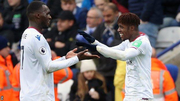 Christian Benteke and Wilfried Zaha celebrate