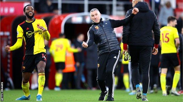 Nigel Pearson celebrates Watford's victory at Bournemouth