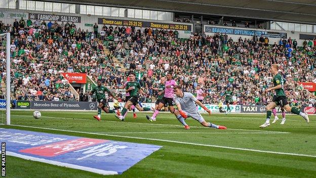 Having been on Plymouth's books since he was eight years old Ryan Law (right) scored his first-ever goal for Argyle late in the victory