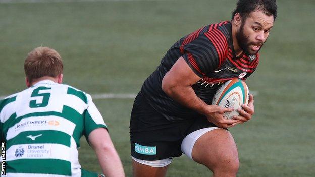 Billy Vunipola runs with the ball