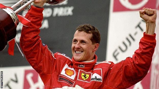 8 Oct 2000: Michael Schumacher of Germany and the Ferrari team celebrates winning the World Championship at the Japanese Formula One Grand Prix in Suzuka, Japan