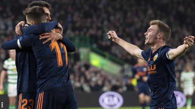 Valencia's Denis Cheryshev (centre) celebrates his opener with his team mates