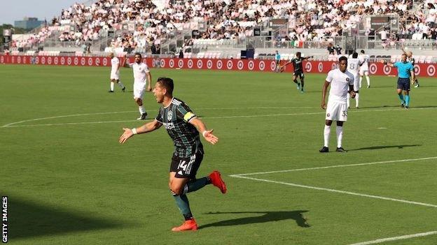 Javier Hernandez celebrates scoring