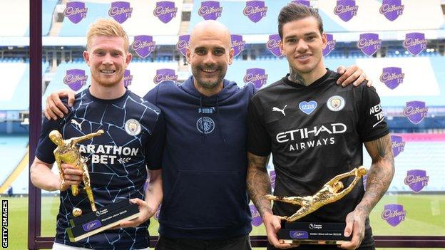 Manchester City midfielder Kevin de Bruyne, manager Pep Guardiola and goalkeeper Ederson
