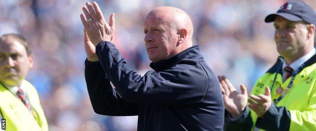 Peter Houston applauds the Falkirk supporters at the final whistle