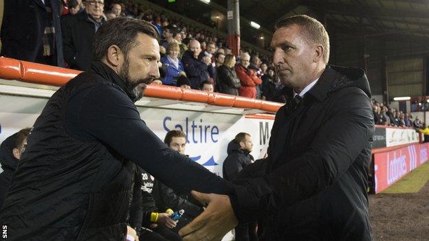 Derek McInnes and Brendan Rodgers shake hands after Celtic's 3-0 win at Aberdeen earleir this season